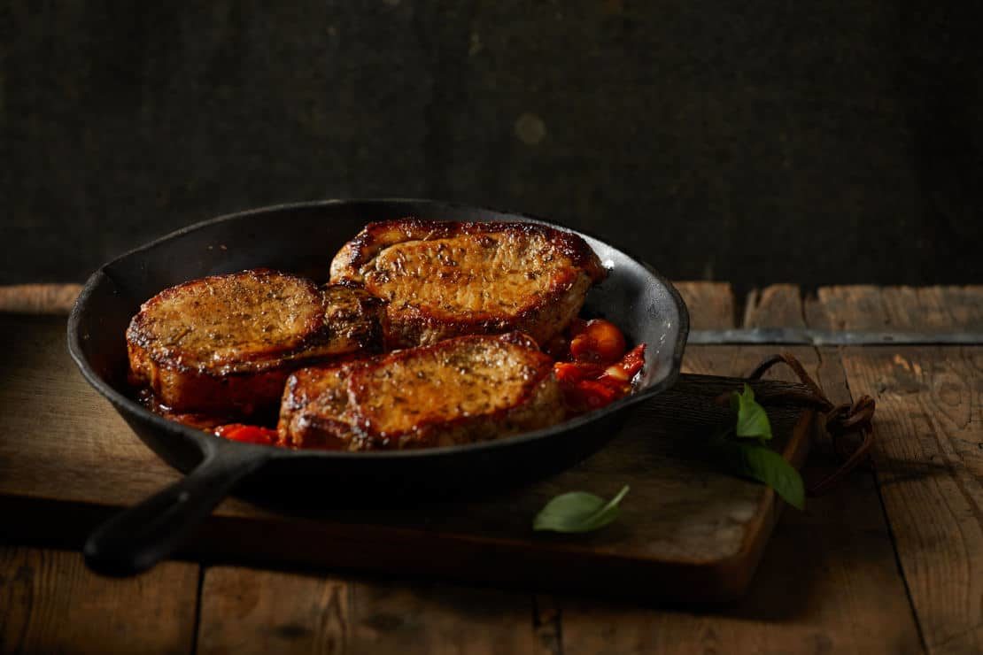 Italian pork loin steaks with cherry tomato sauce